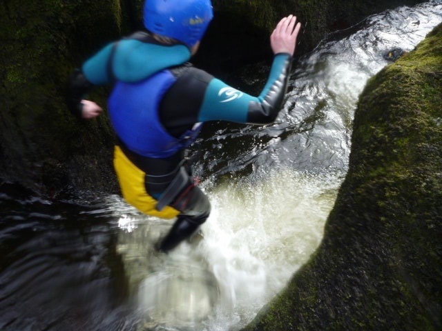 ghyll scrambling in the lake district. Also known as canyoning.