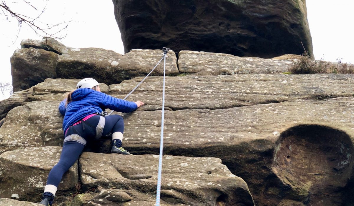 child rock climbing in yorkshire