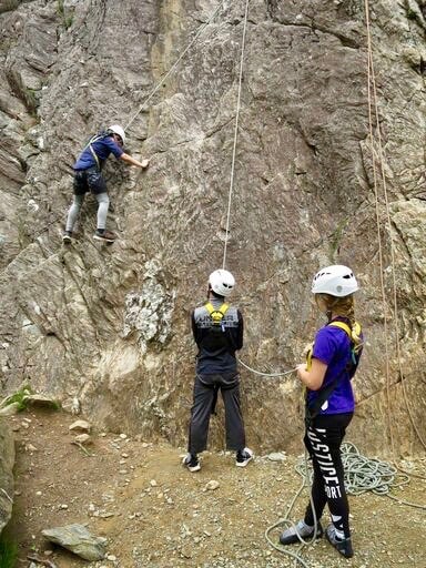Group rock climbing